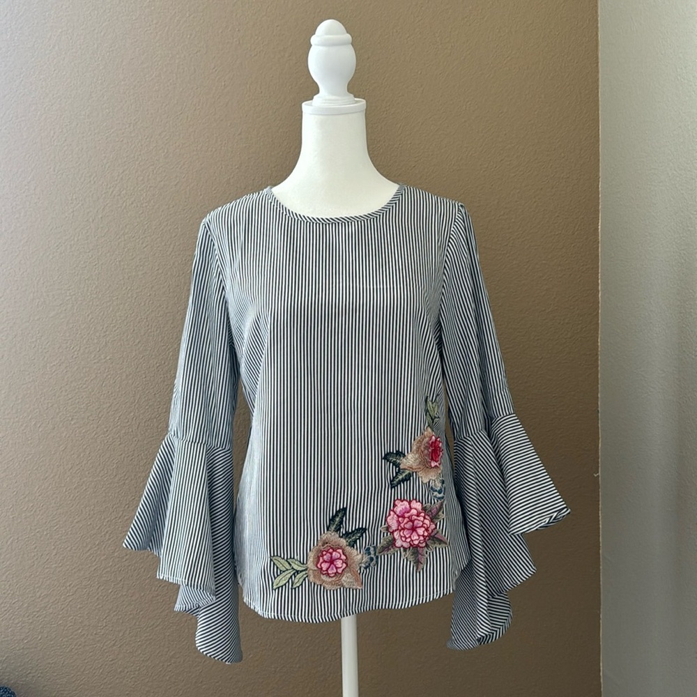 Striped blouse with floral embroidery